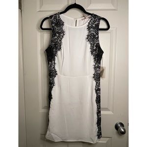 Small white with black lace dress